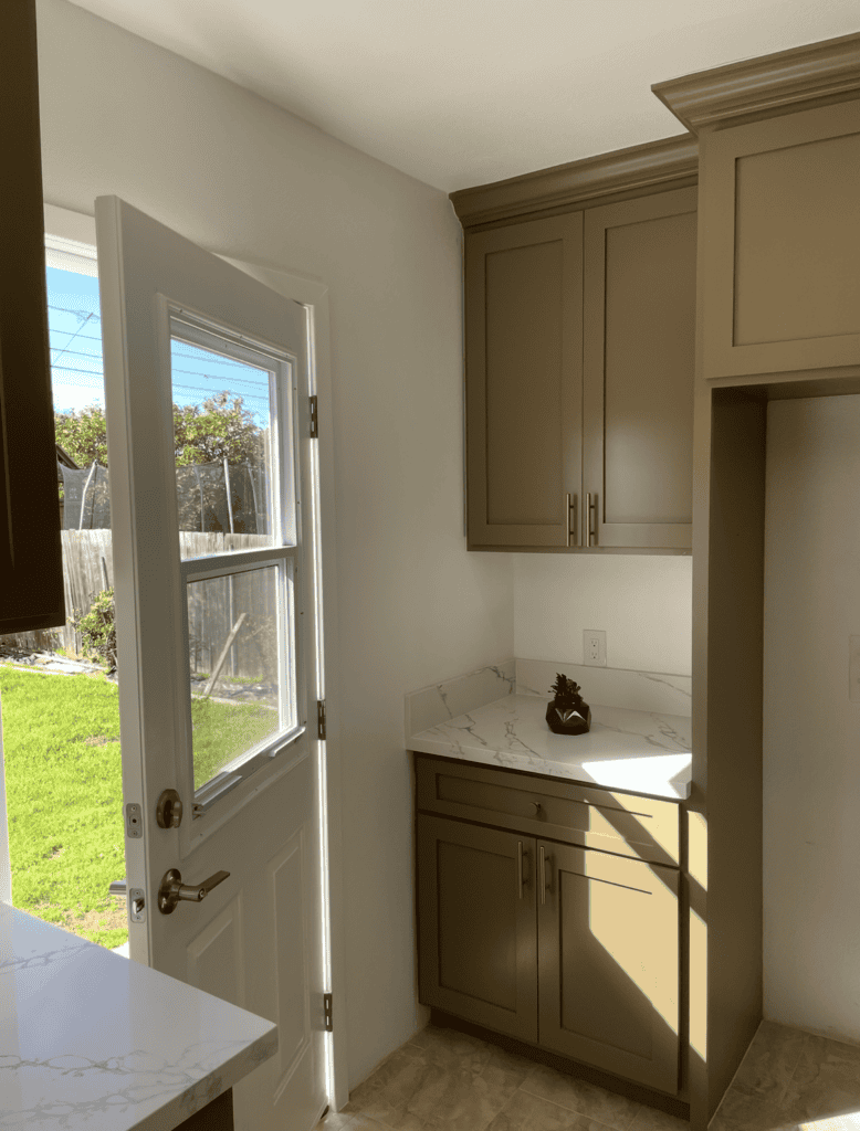 Kitchen cabinetry and natural light in a modern home.